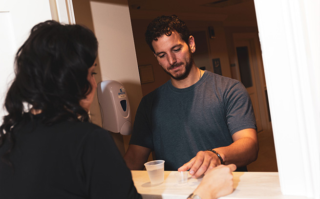 patient with a nurse getting medications in Duluth